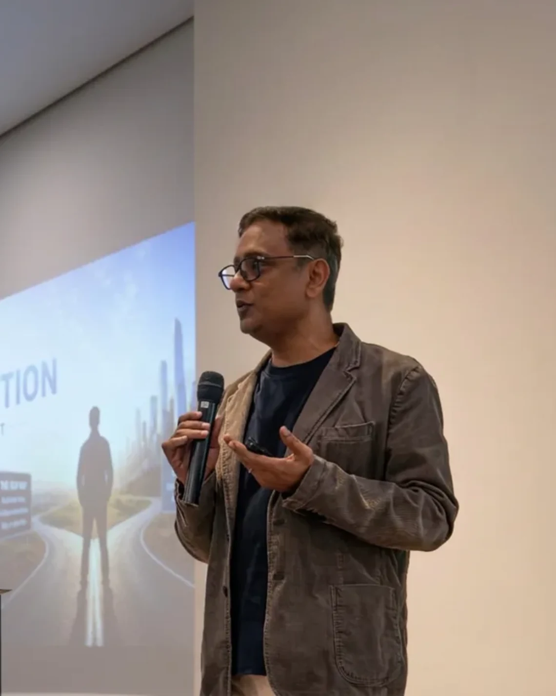 Swarup Biswas speaking to business leaders about applied AI.